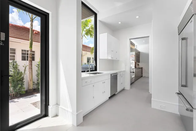 a room with furniture and flat screen tv