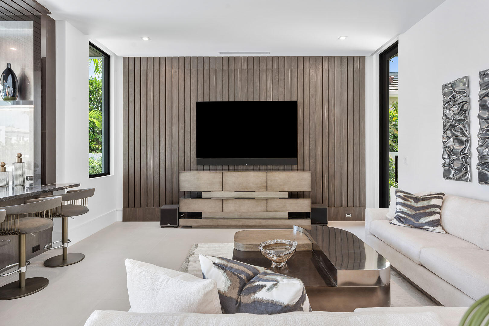 169 Coconut Palm Road Boca Raton, FL 33432 - Photo 34 of 84 a living room with furniture and a flat screen tv