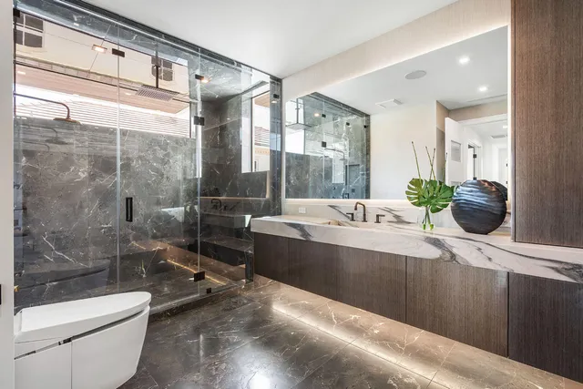 a picture of a bathroom with a sink