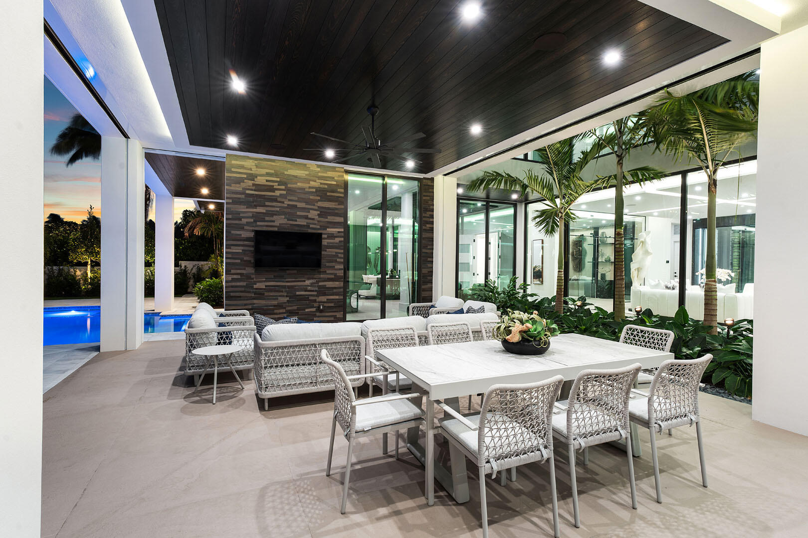 169 Coconut Palm Road Boca Raton, FL 33432 - Photo 68 of 84 a dining room with furniture and large windows