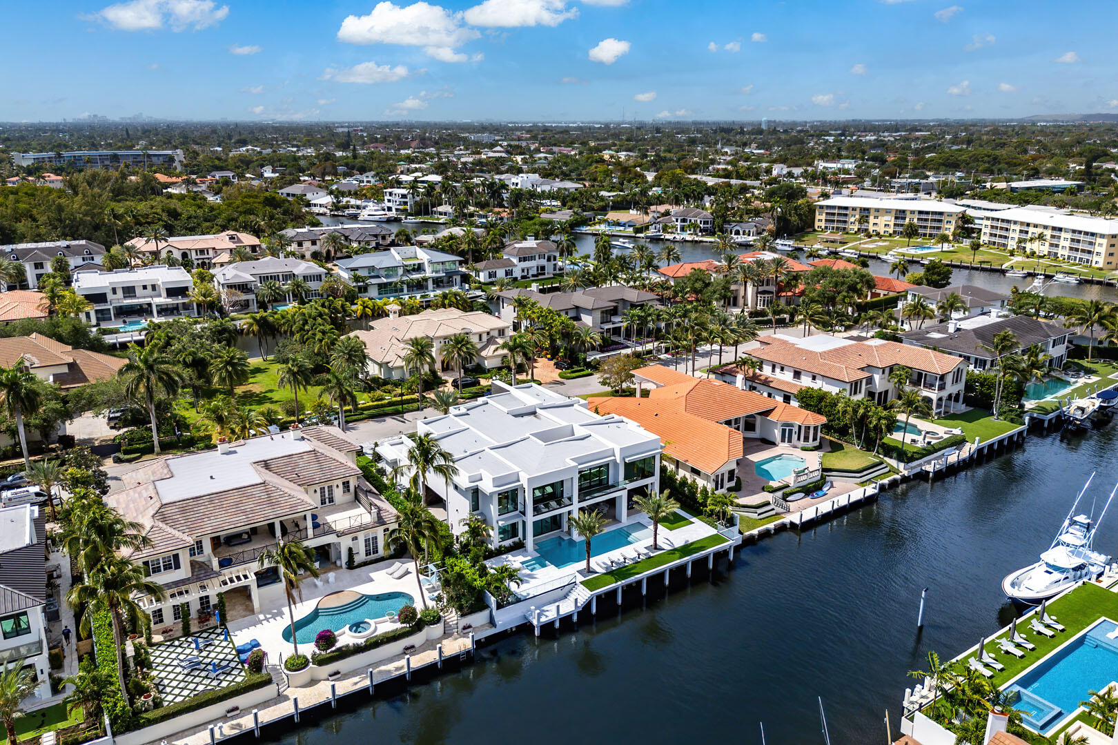 169 Coconut Palm Road Boca Raton, FL 33432 - Photo 81 of 84 an aerial view of residential houses with outdoor space and swimming pool
