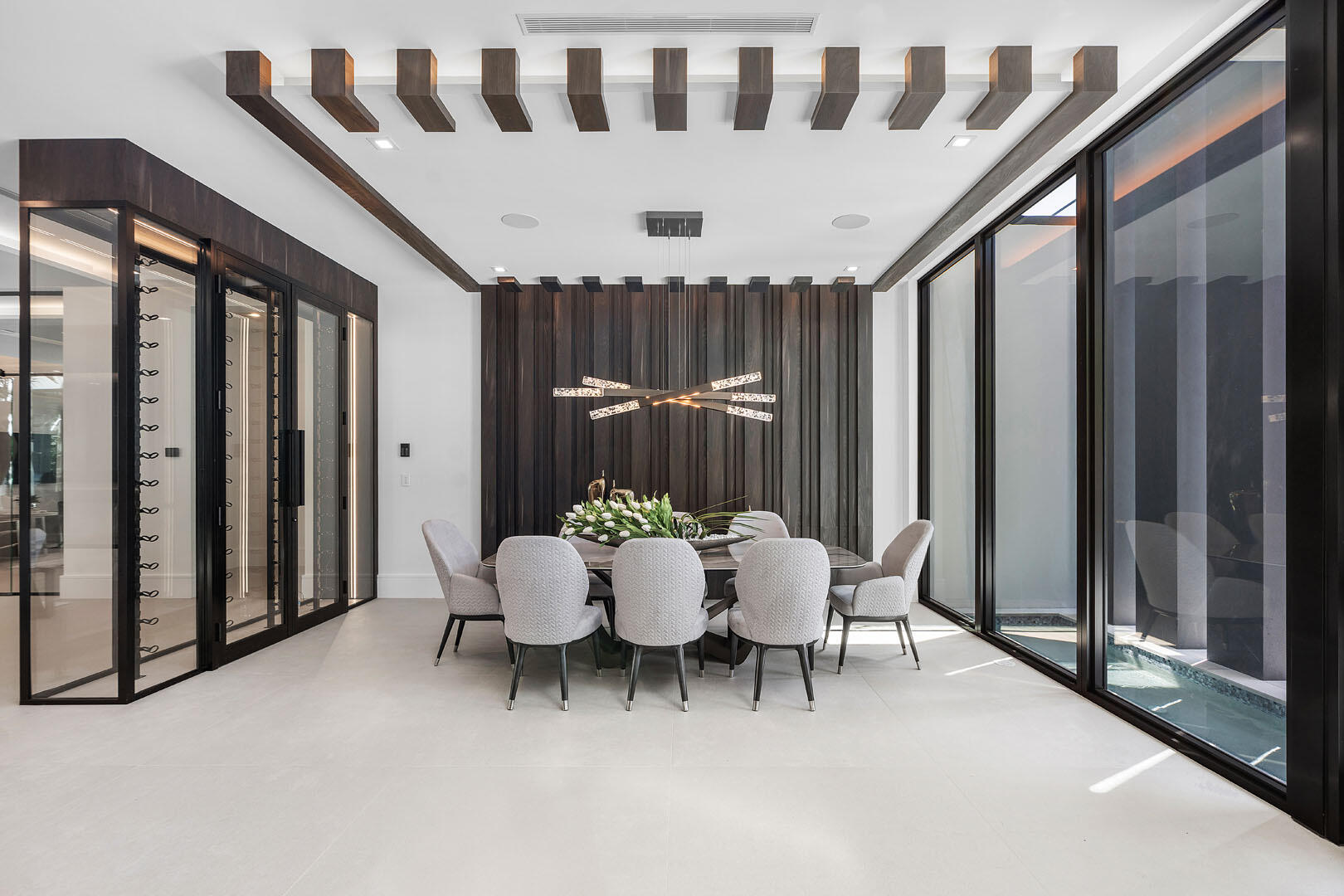 169 Coconut Palm Road Boca Raton, FL 33432 - Photo 9 of 84 a view of an chairs and tables in the balcony