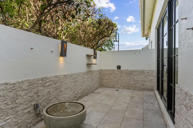 a kitchen with a sink and a stove top oven