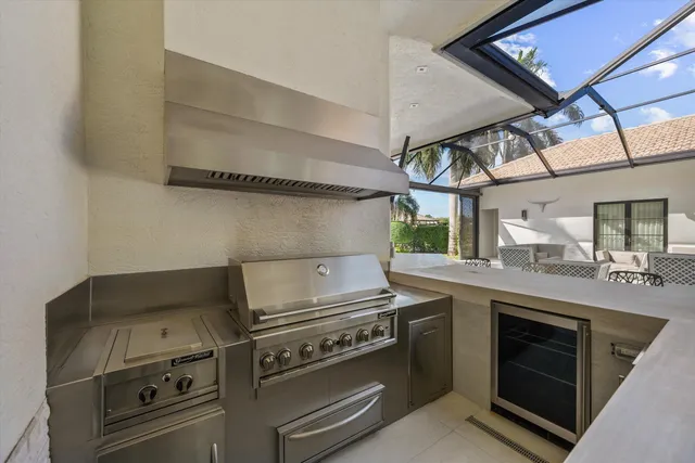 a view of a swimming pool with a yard