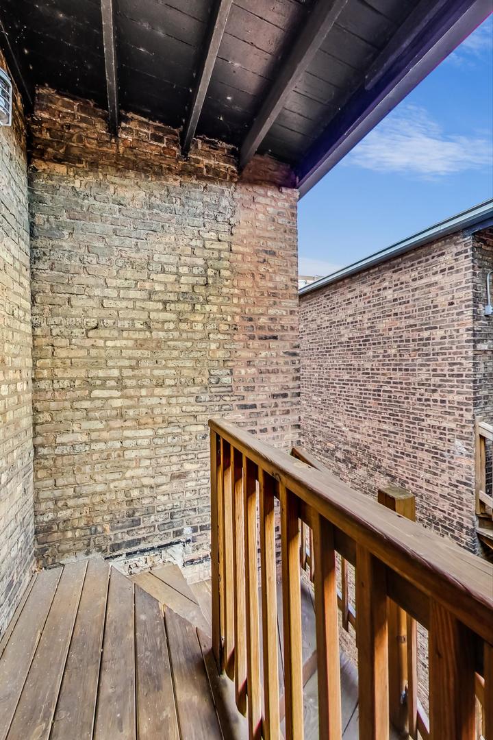 537 West Addison Street, Unit 3S Chicago, IL 60613 - Photo 17 of 19 a view of wooden floor with a wooden bridge