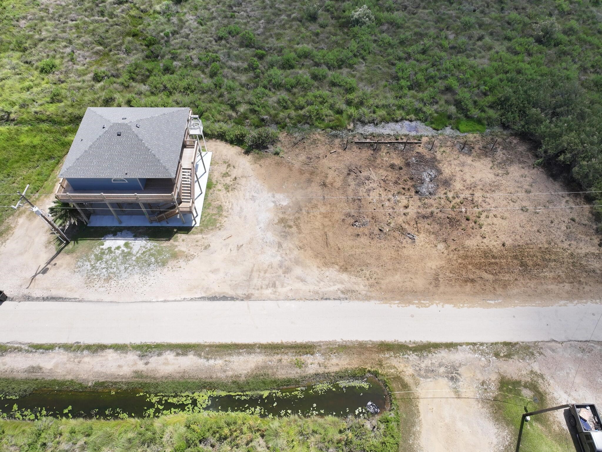 21 Faggards Road Port Bolivar, TX 77650 - Photo 5 of 13 an aerial view of a house with a yard