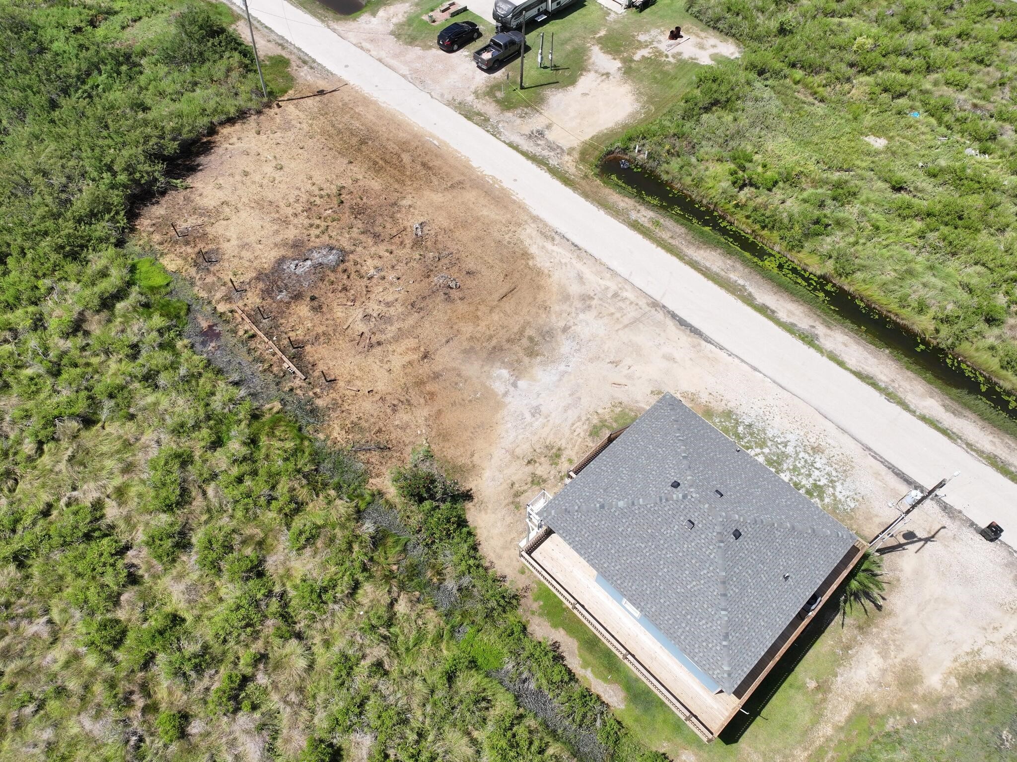 21 Faggards Road Port Bolivar, TX 77650 - Photo 10 of 13 a view of a bench in a yard