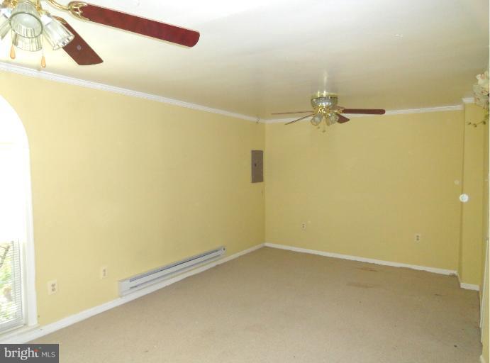 8711 Victoria Road Springfield, VA 22151 - Photo 8 of 15 a view of an empty room
