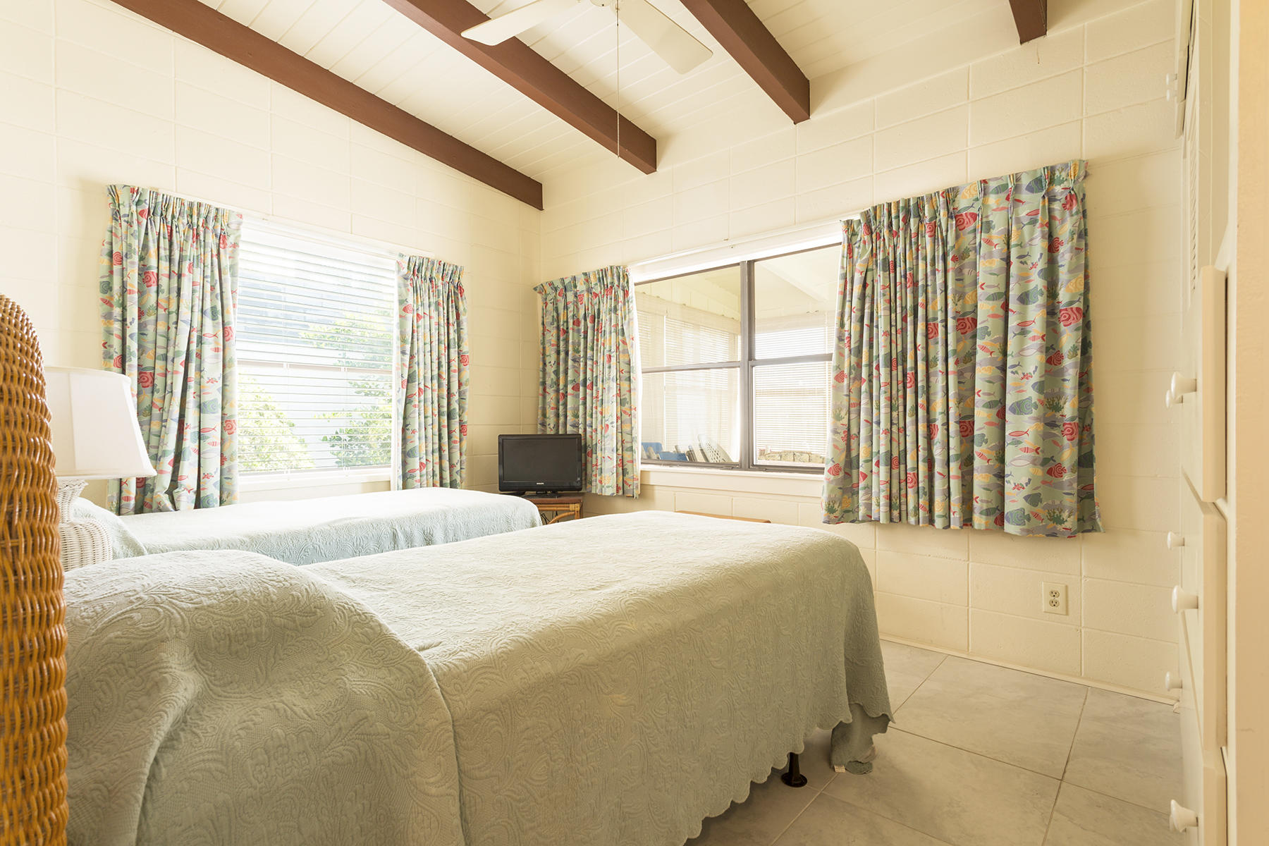 644 Blue Mountain Road Santa Rosa Beach, FL 32459 - Photo 11 of 17 a bedroom with a bed and a window