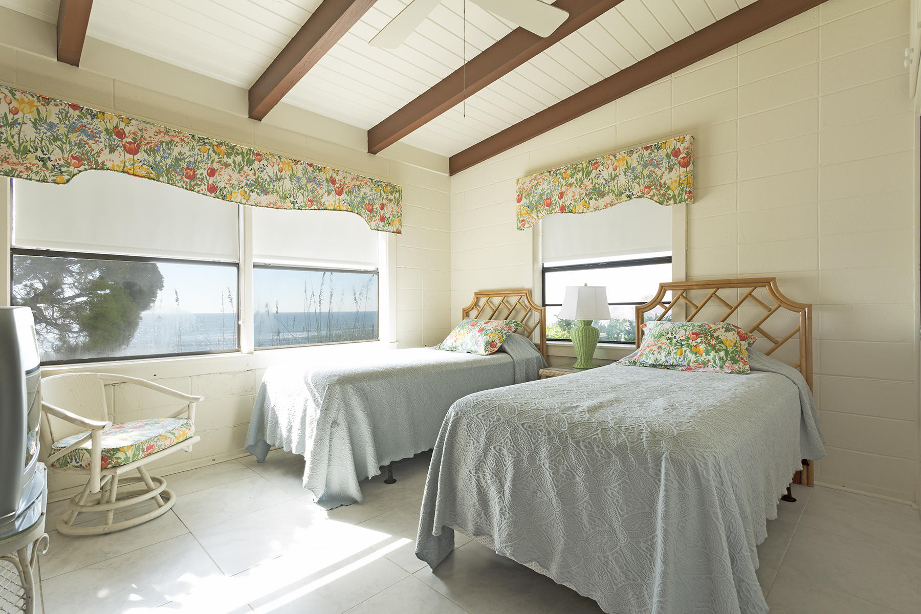 644 Blue Mountain Road Santa Rosa Beach, FL 32459 - Photo 12 of 17 a bedroom with two beds and a large window