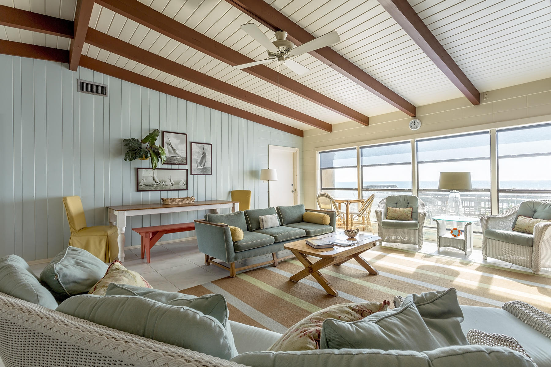 644 Blue Mountain Road Santa Rosa Beach, FL 32459 - Photo 3 of 17 a living room with furniture and a large window