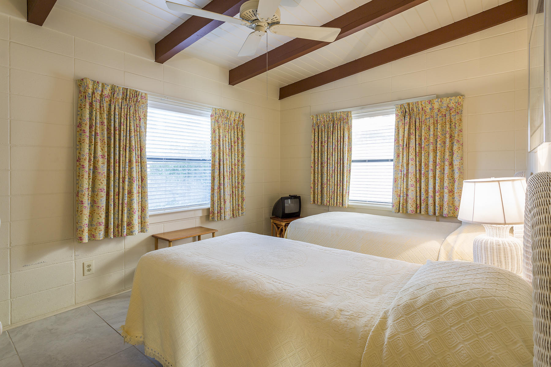 644 Blue Mountain Road Santa Rosa Beach, FL 32459 - Photo 10 of 17 a bedroom with a large bed and a large window