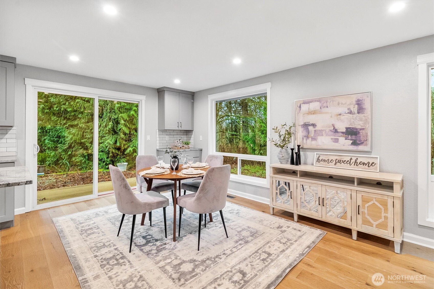 299 Friday Creek Road Bellingham, WA 98229 - Photo 11 of 36 a dining room with furniture and a large window