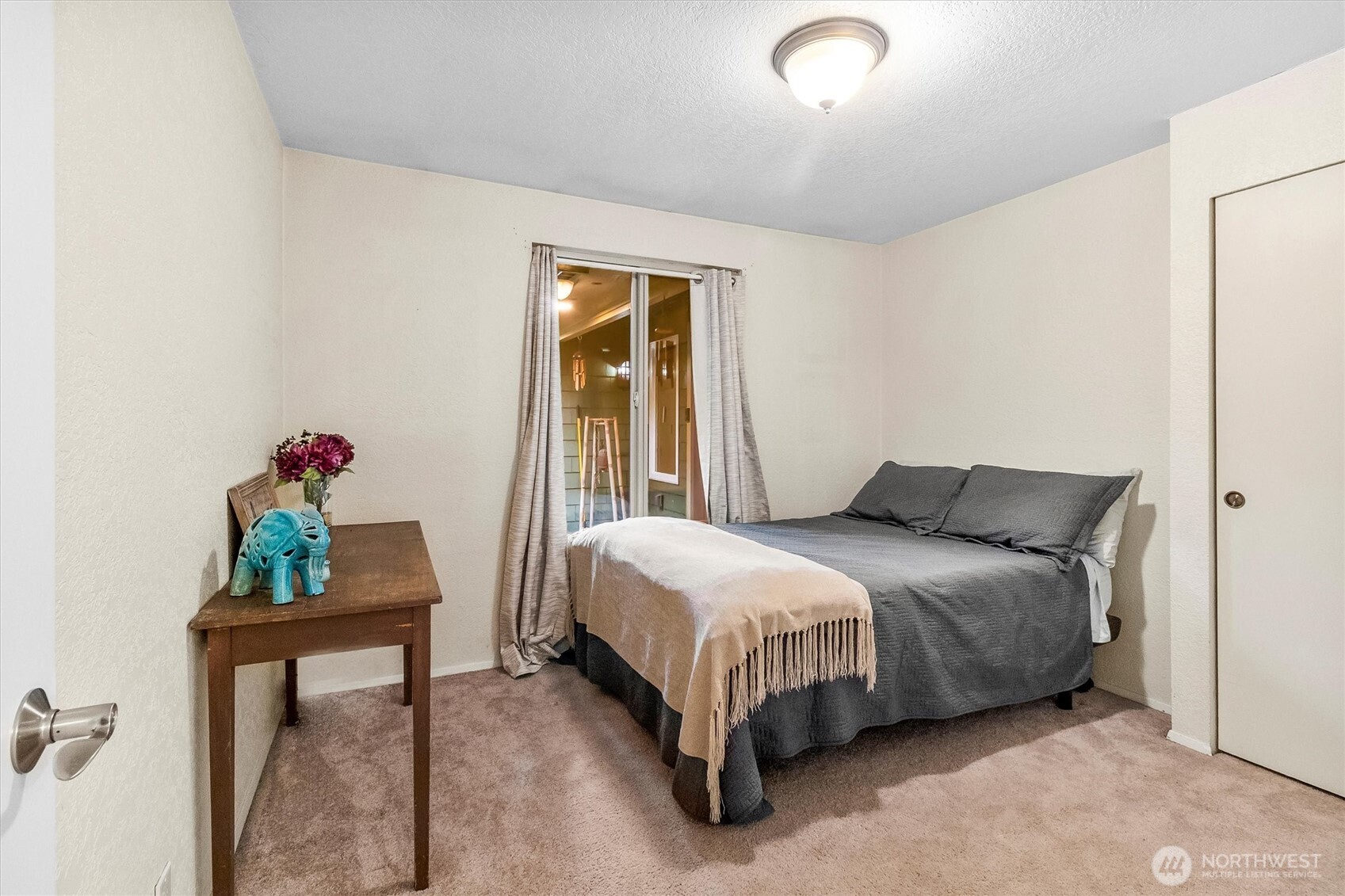 299 Friday Creek Road Bellingham, WA 98229 - Photo 19 of 36 a bedroom with a bed table and a window