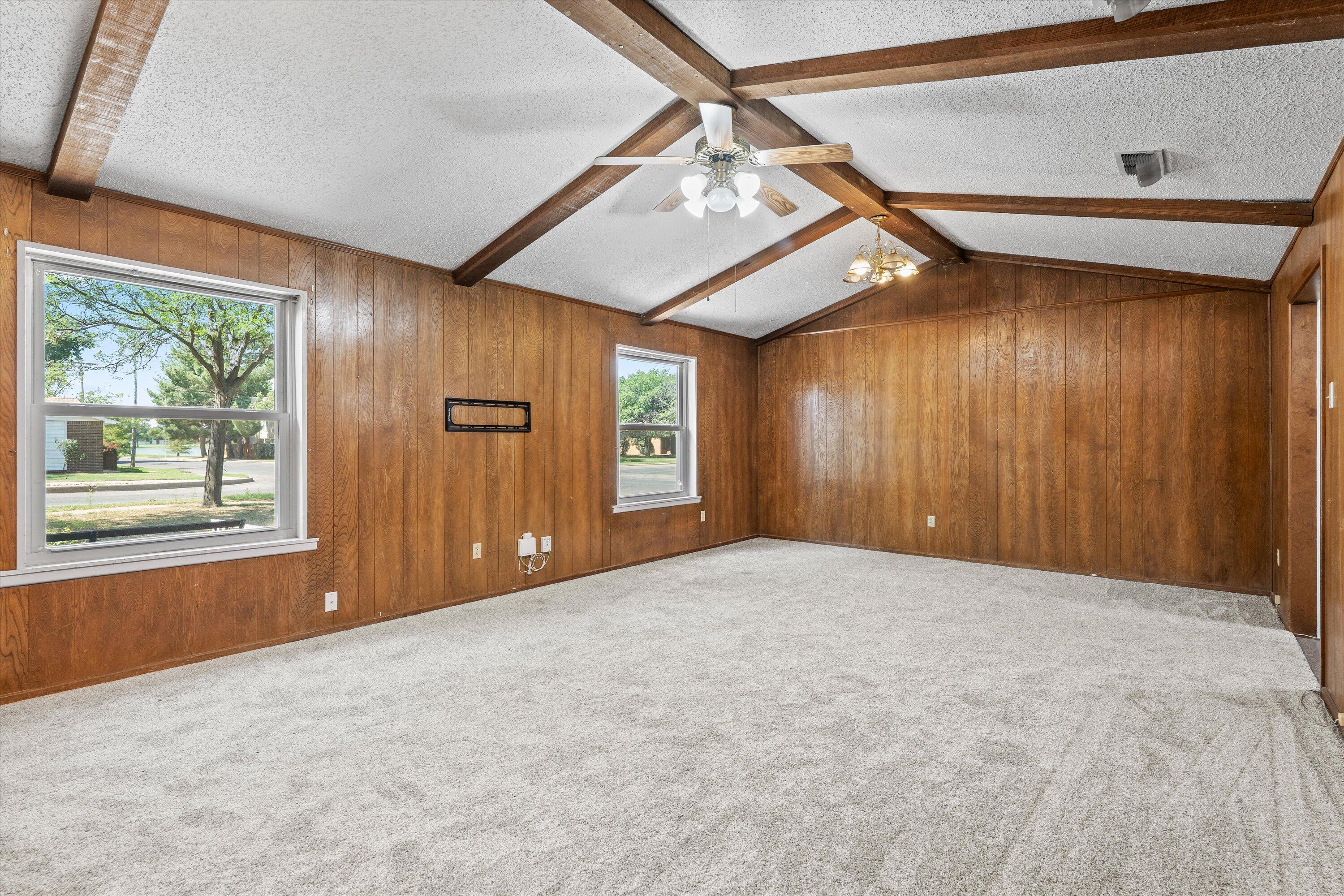 4520 54th Street Lubbock, TX 79414 - Photo 6 of 32 a view of an empty room with a window