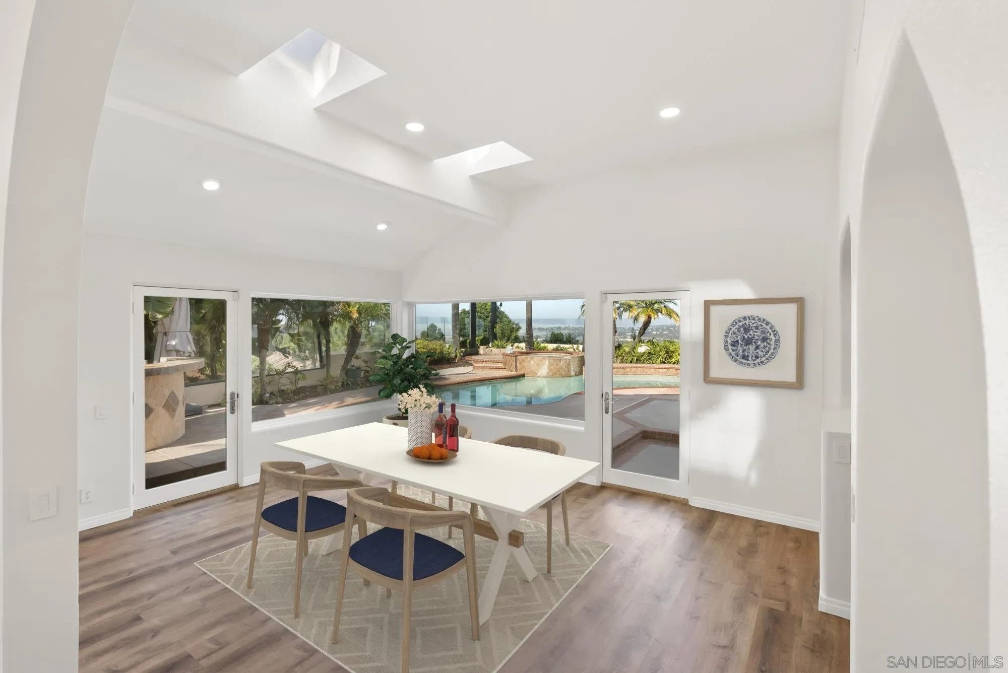 13404 Kibbings Road San Diego, CA 92130 - Photo 11 of 32 a view of a dining room with furniture and a window