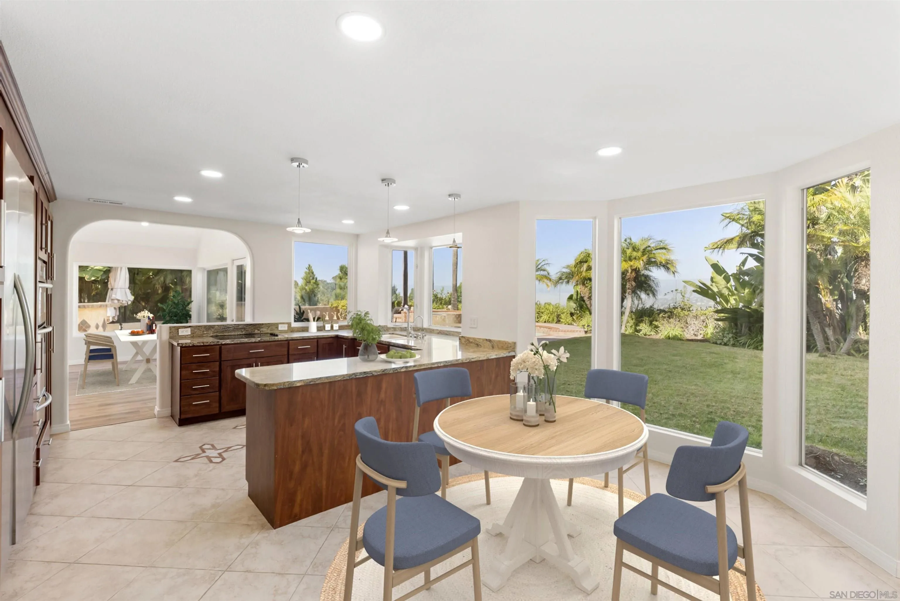 13404 Kibbings Road San Diego, CA 92130 - Photo 14 of 32 a view of a dining room with furniture window and outside view