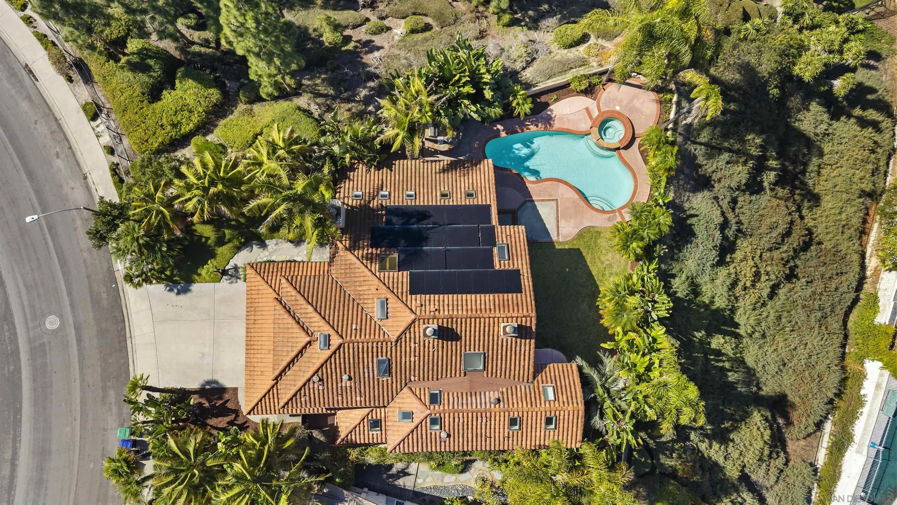 13404 Kibbings Road San Diego, CA 92130 - Photo 2 of 32 an aerial view of a house with a yard and garden