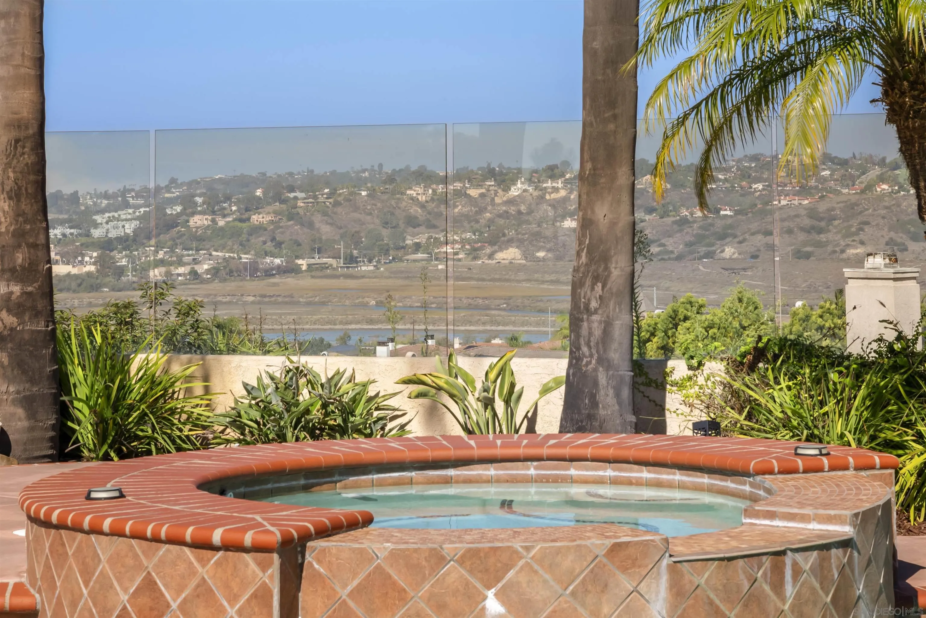 13404 Kibbings Road San Diego, CA 92130 - Photo 28 of 32 a view of a swimming pool with a yard