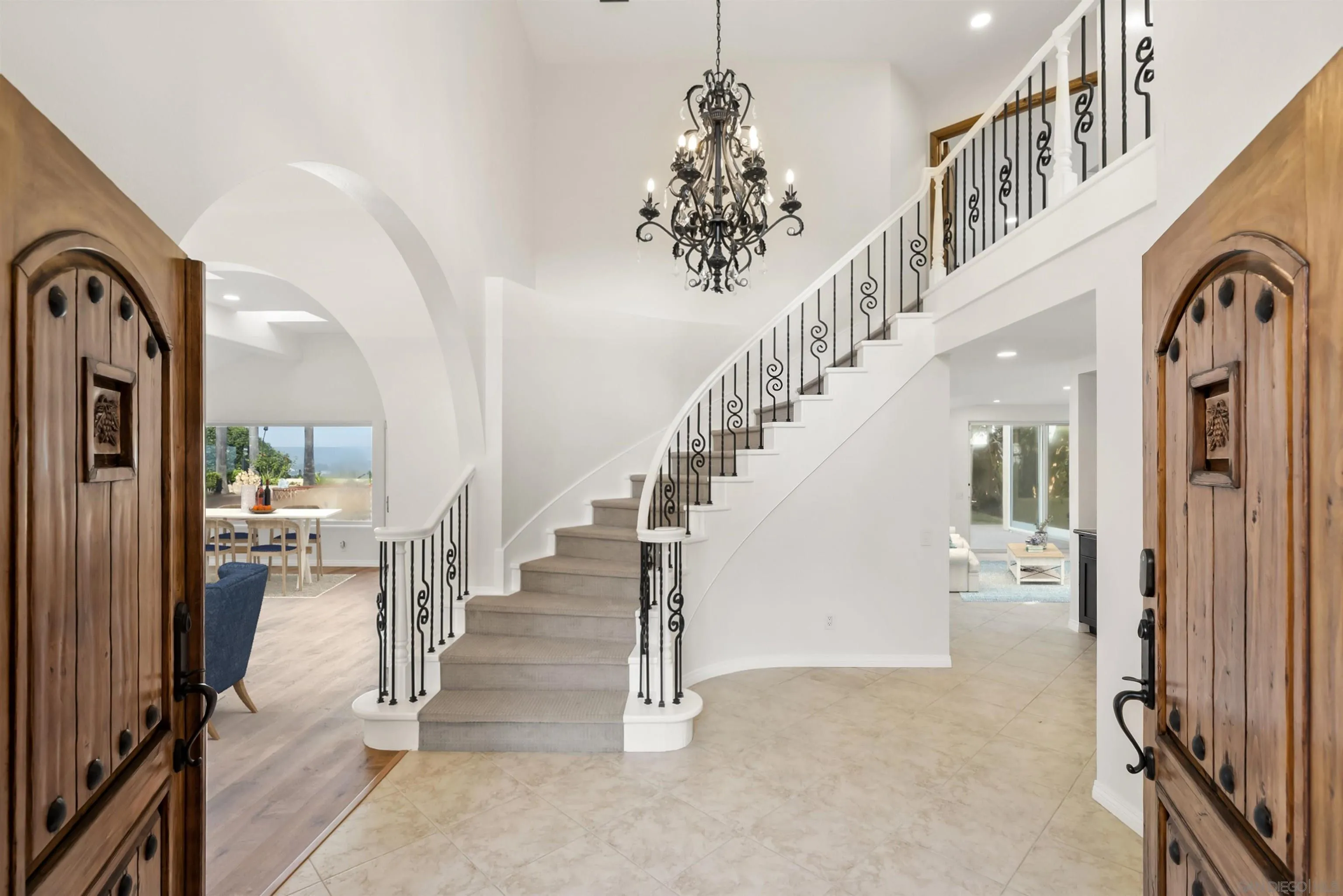 13404 Kibbings Road San Diego, CA 92130 - Photo 6 of 32 a view of entryway and hall with wooden floor