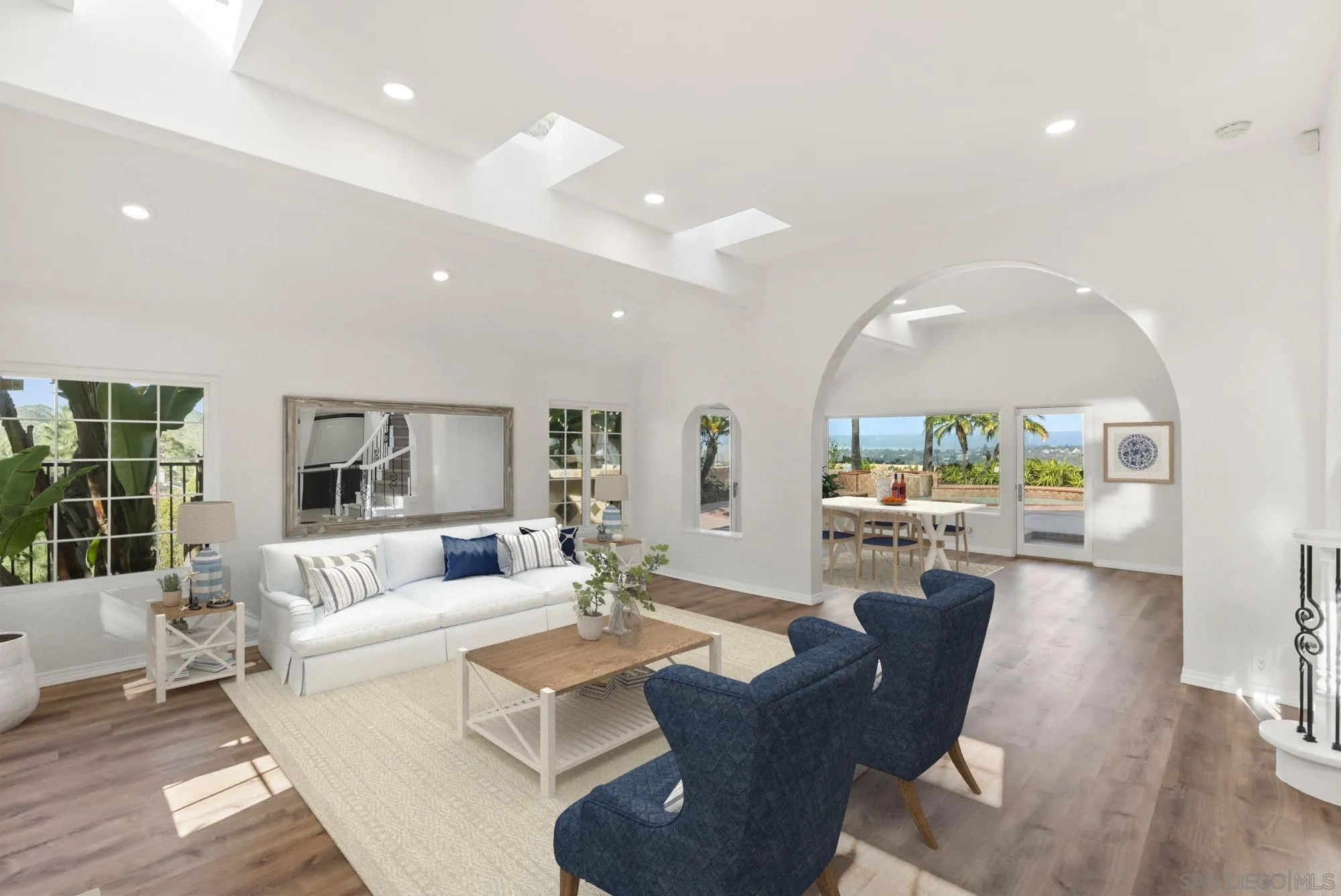 13404 Kibbings Road San Diego, CA 92130 - Photo 9 of 32 a living room with furniture and a large window