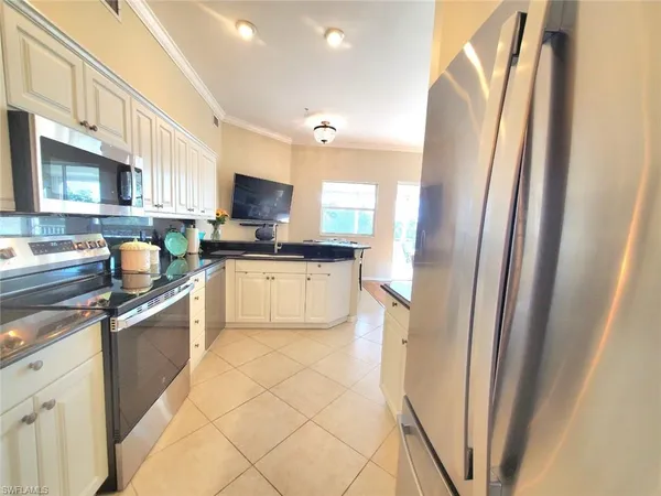 $515,000 | 945 Eastham Way, Unit H203, Naples, FL 34104