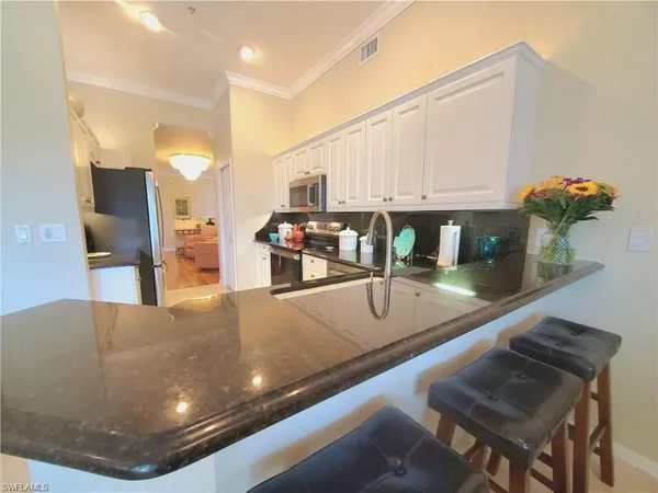 $515,000 | 945 Eastham Way, Unit H203, Naples, FL 34104