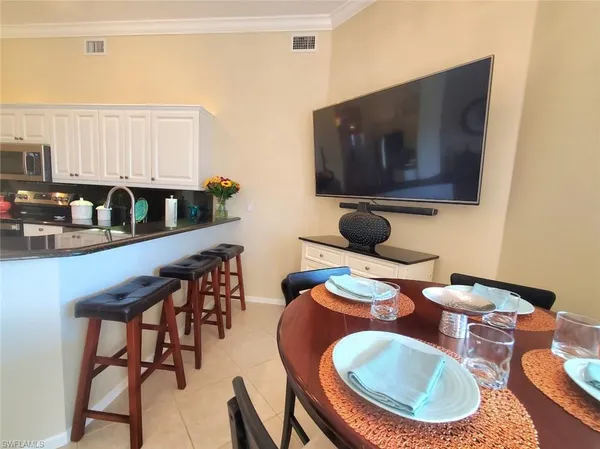 $515,000 | 945 Eastham Way, Unit H203, Naples, FL 34104