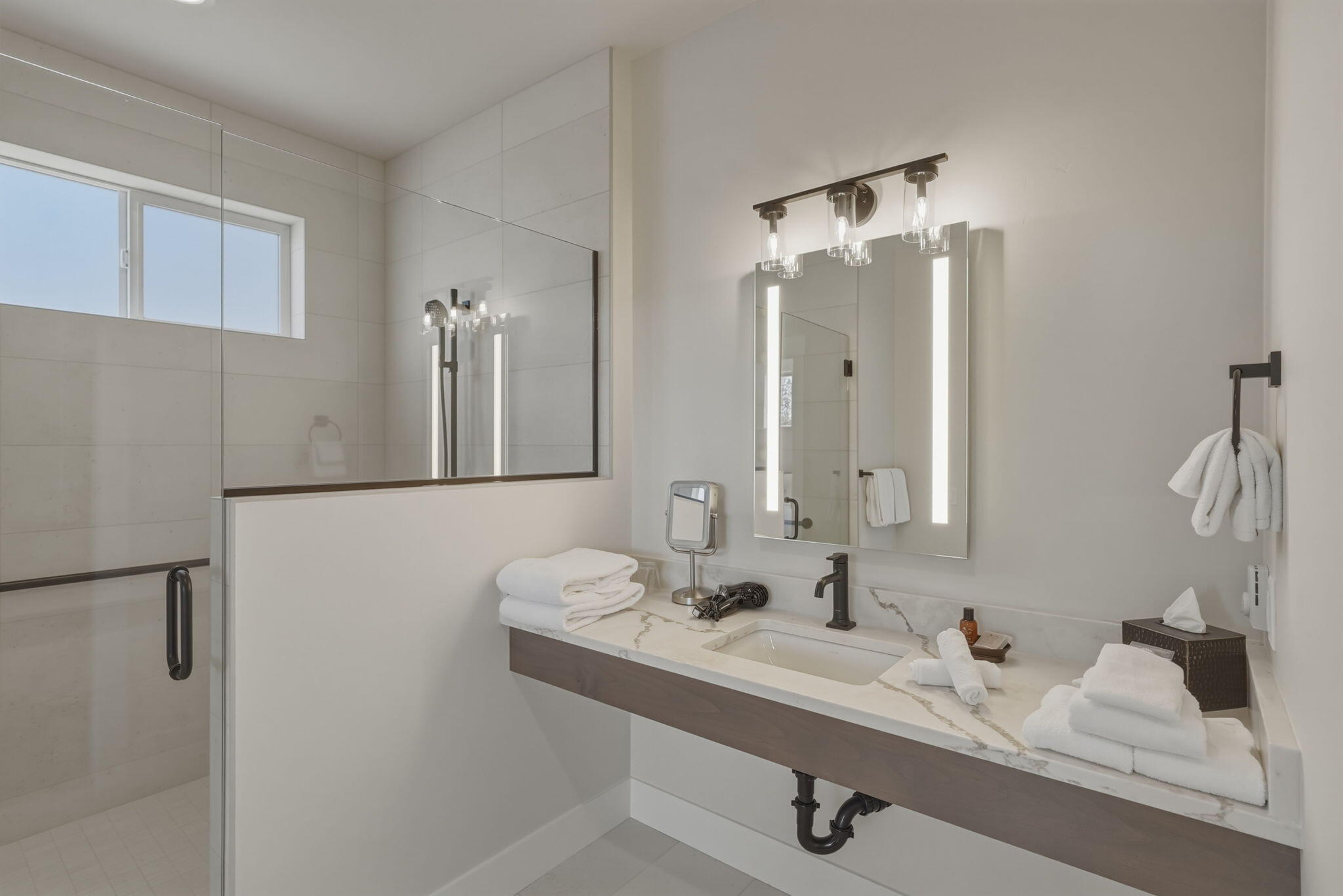 16636 South W Brasada Ranch Road, Unit CABIN 107 Powell Butte, OR 97753 - Photo 11 of 33 This primary bathroom features an accessible roll-in shower