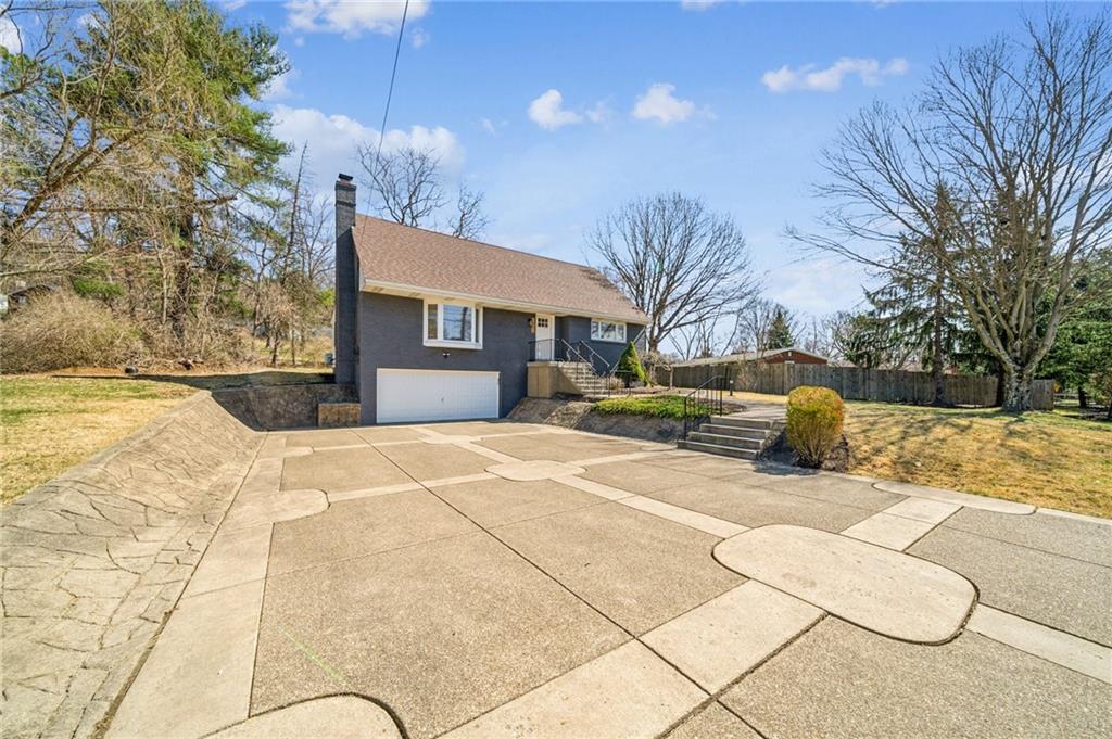 1352 Powers Run Road Pittsburgh, PA 15238 - Photo 2 of 41 Extra-large driveway fits up to 9 cars.