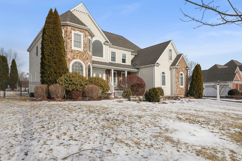 21 Coach Road North Attleboro, MA 02760 - Photo 5 of 6 a front view of a house with a yard