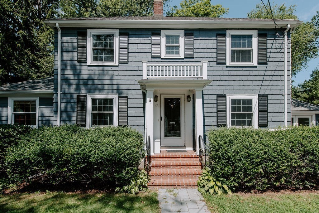 17 Eliot Road Belmont, MA 02478 - Photo 2 of 37 a front view of a house with a garden