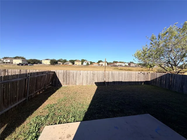 a view of ocean with city