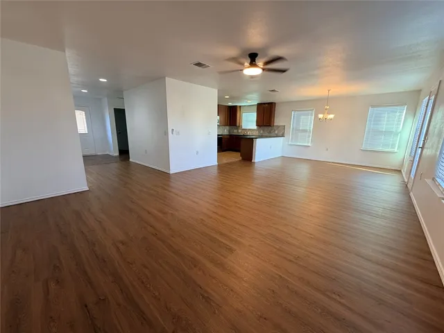 a view of a kitchen with a sink and a microwave