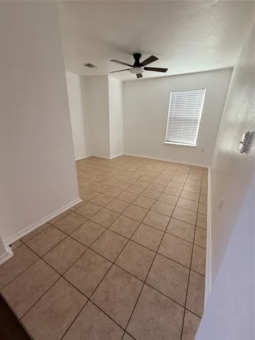a view of a livingroom and a bathroom