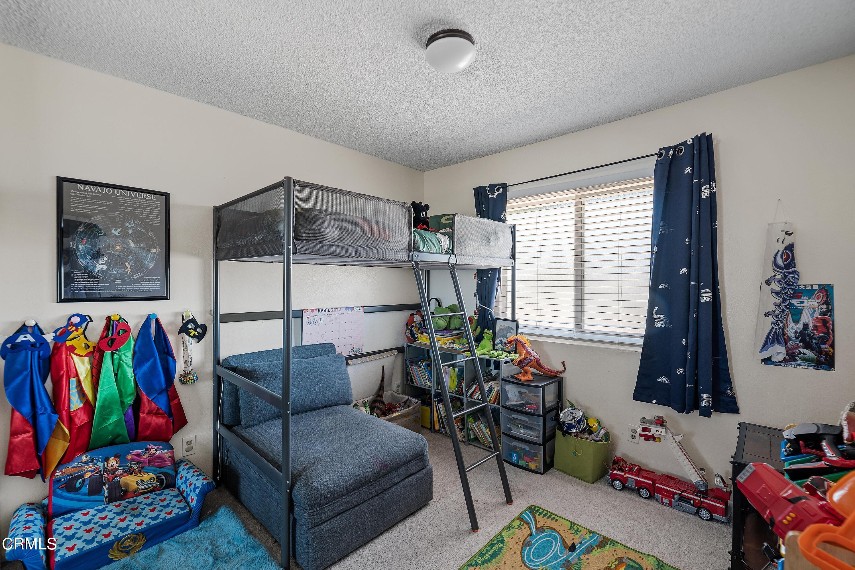 5319 Perkins Road Oxnard, CA 93033 - Photo 18 of 24 a living room with furniture and a window