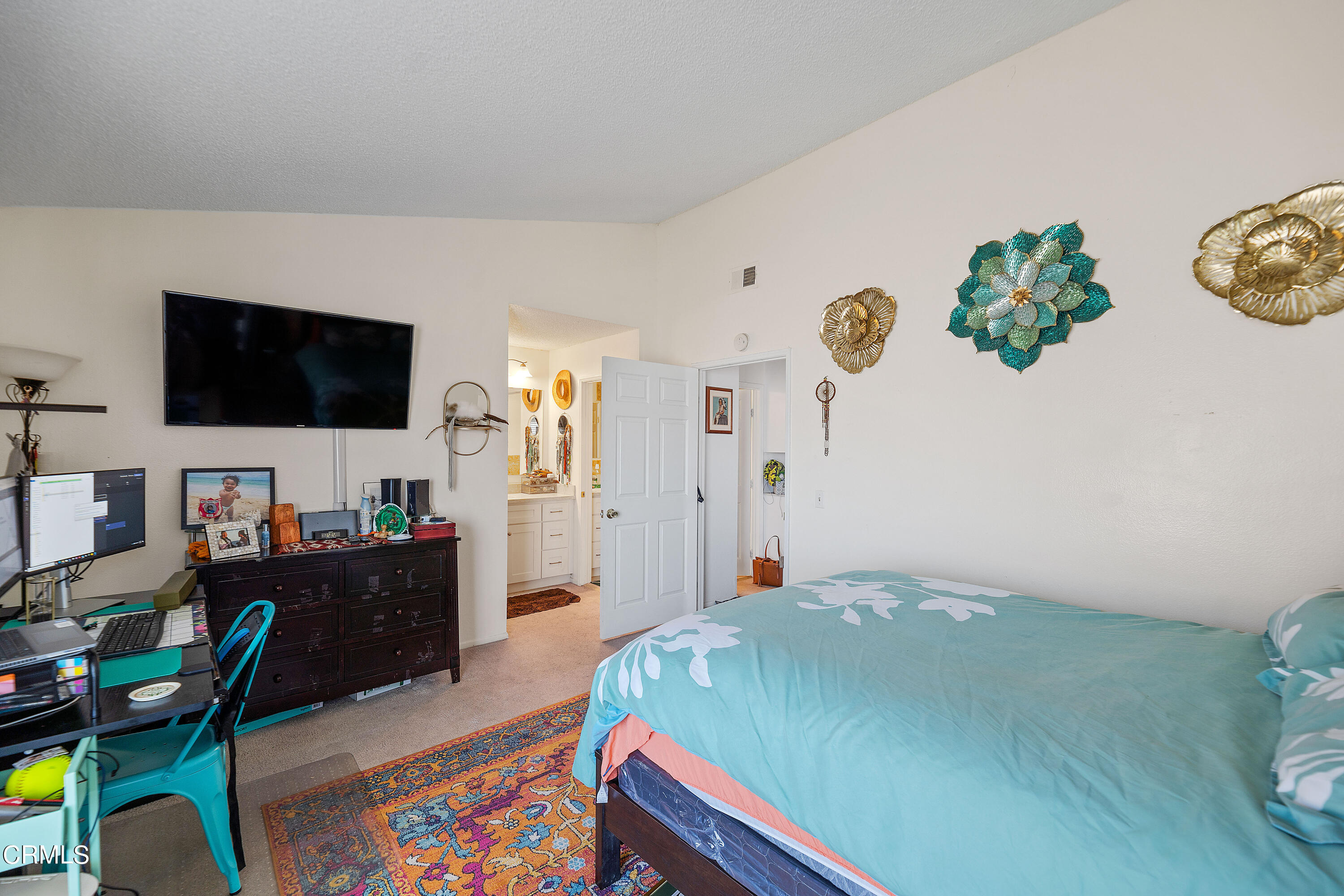 5319 Perkins Road Oxnard, CA 93033 - Photo 20 of 24 a bedroom with a bed and a flat screen tv