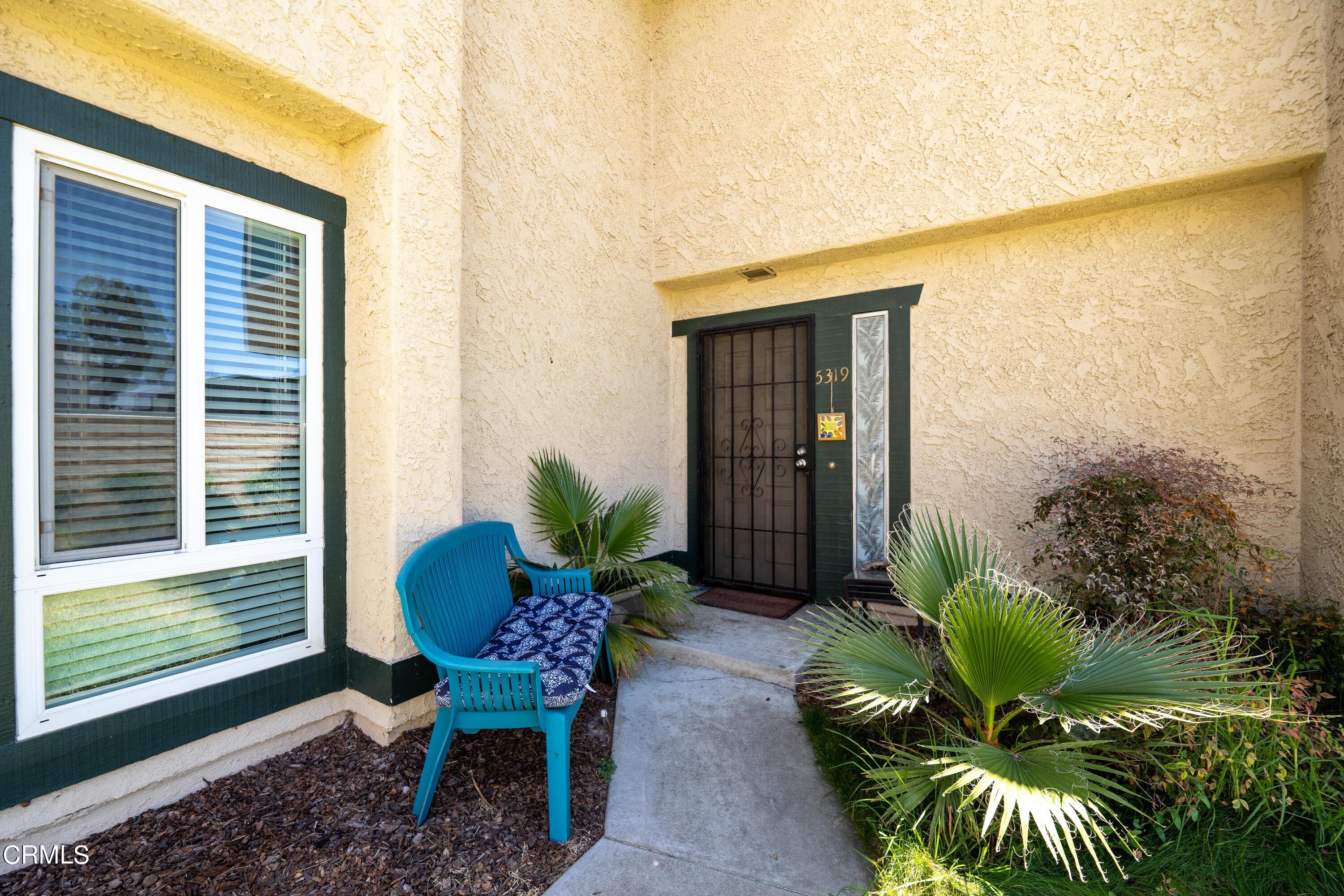 5319 Perkins Road Oxnard, CA 93033 - Photo 2 of 24 a balcony with chairs and potted plants