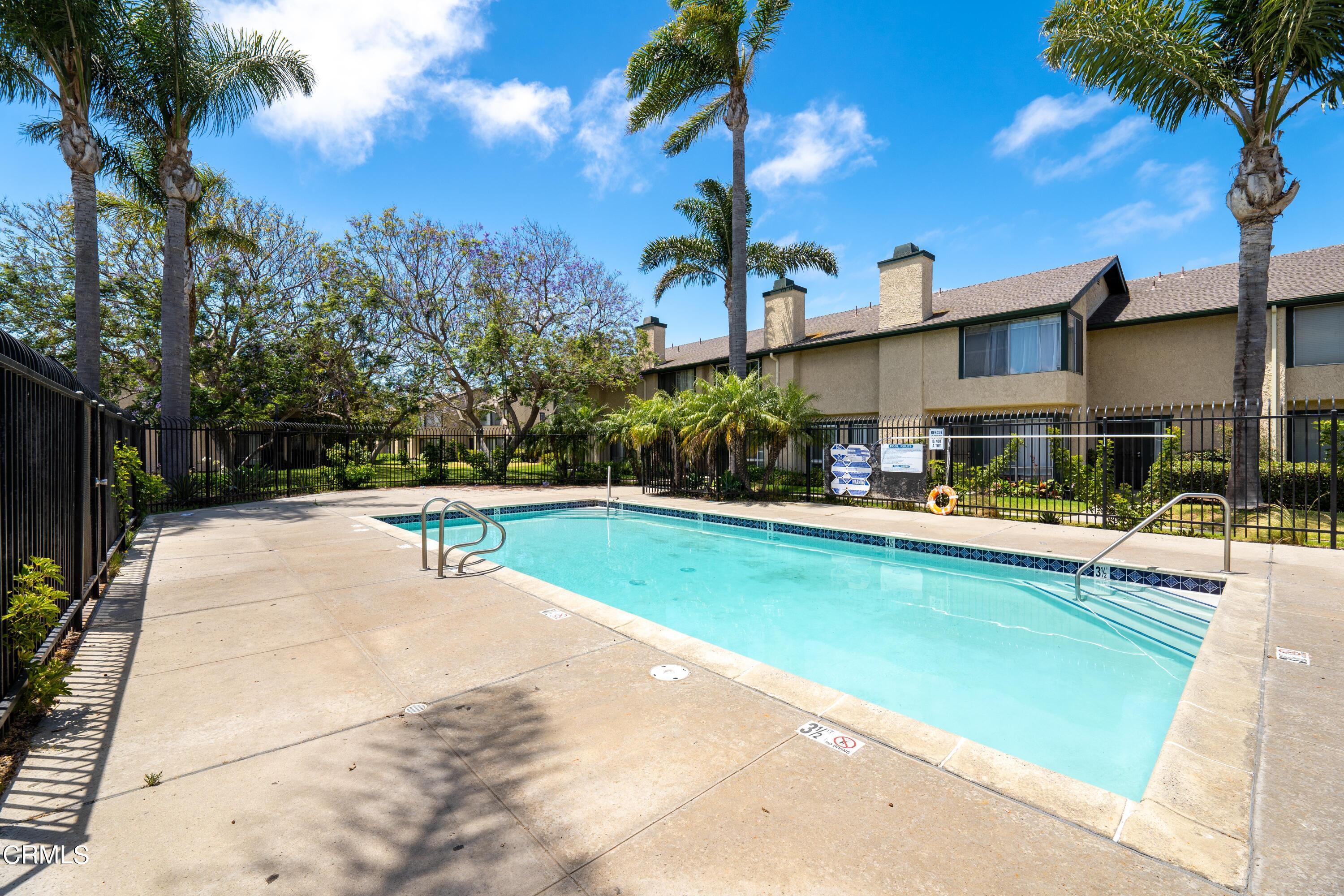 5319 Perkins Road Oxnard, CA 93033 - Photo 23 of 24 a view of a swimming pool with a patio