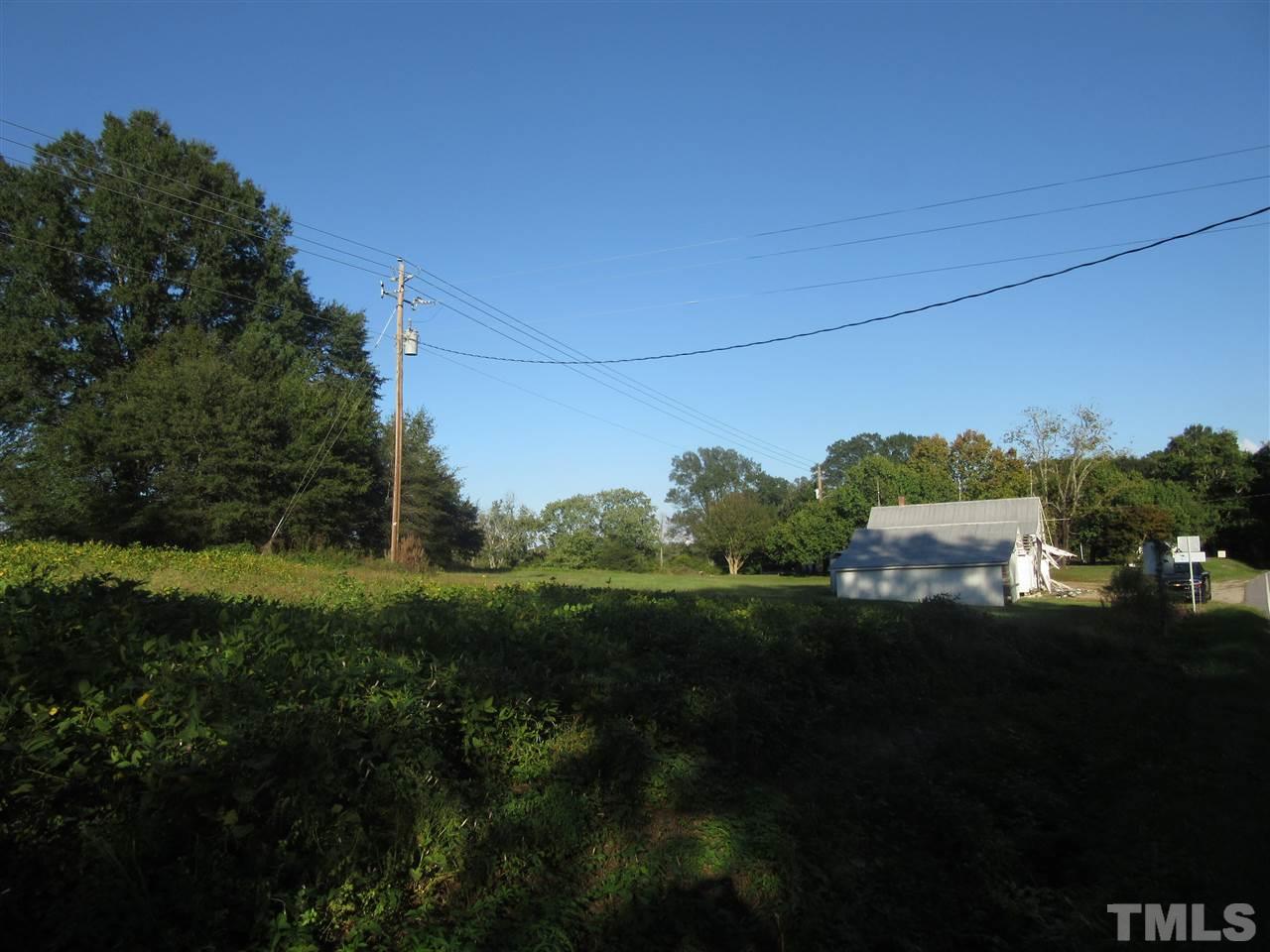8309 Fowler Road Zebulon, NC 27597 - Photo 22 of 22 a view of a yard and mountain view in back