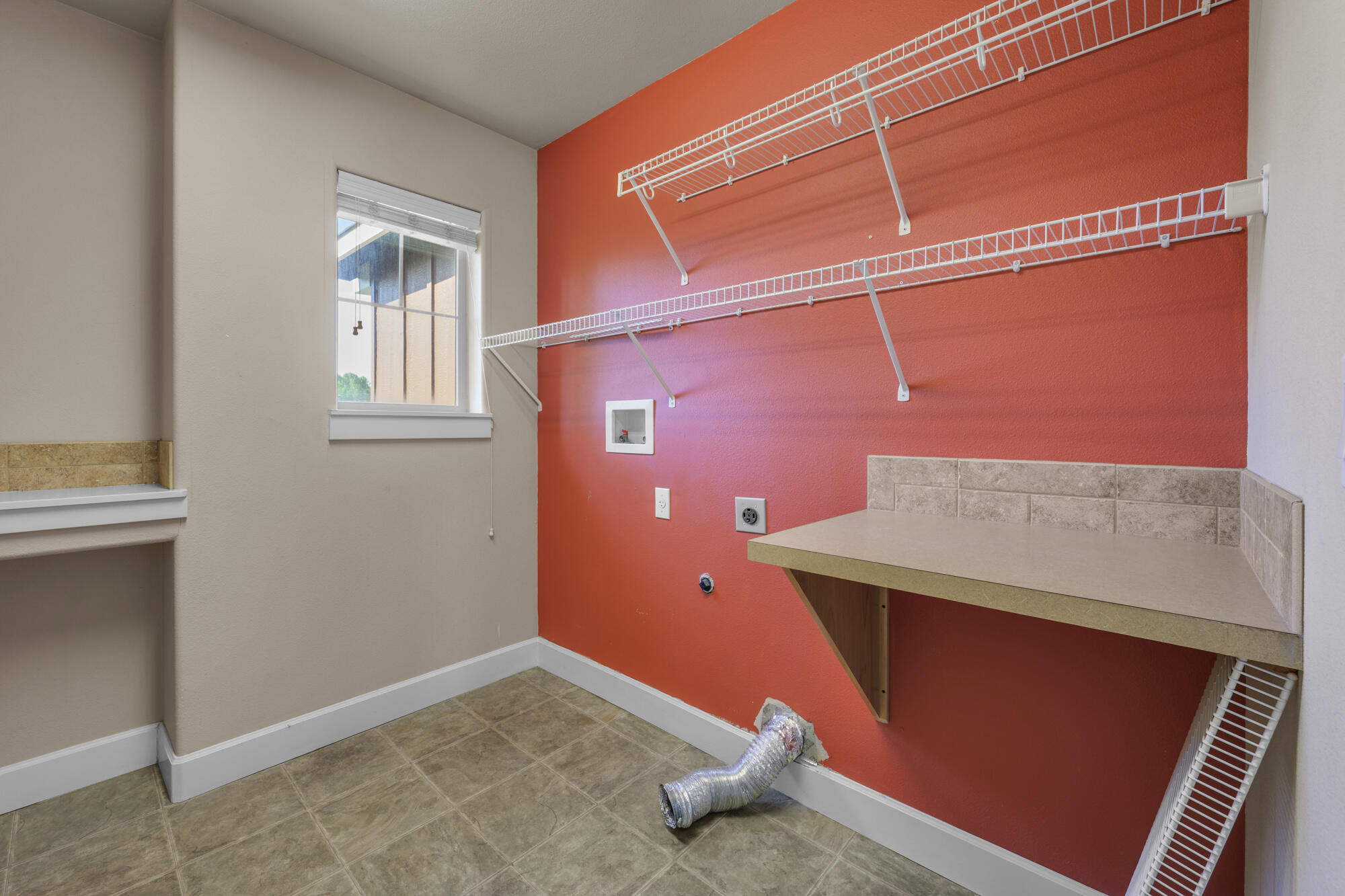 1402 Northeast Hudspeth Road Prineville, OR 97754 - Photo 22 of 36 a view of an empty room with windows