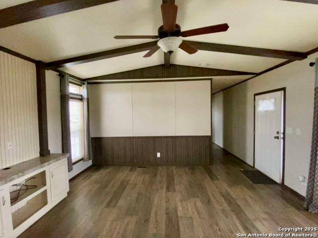 13009 Annette Road Angleton, TX 77515 - Photo 8 of 14 a view of room with window and wooden floor