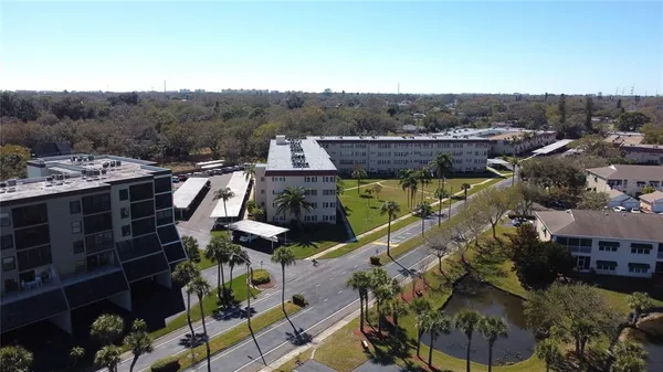 a view of a chairs and table in the patio