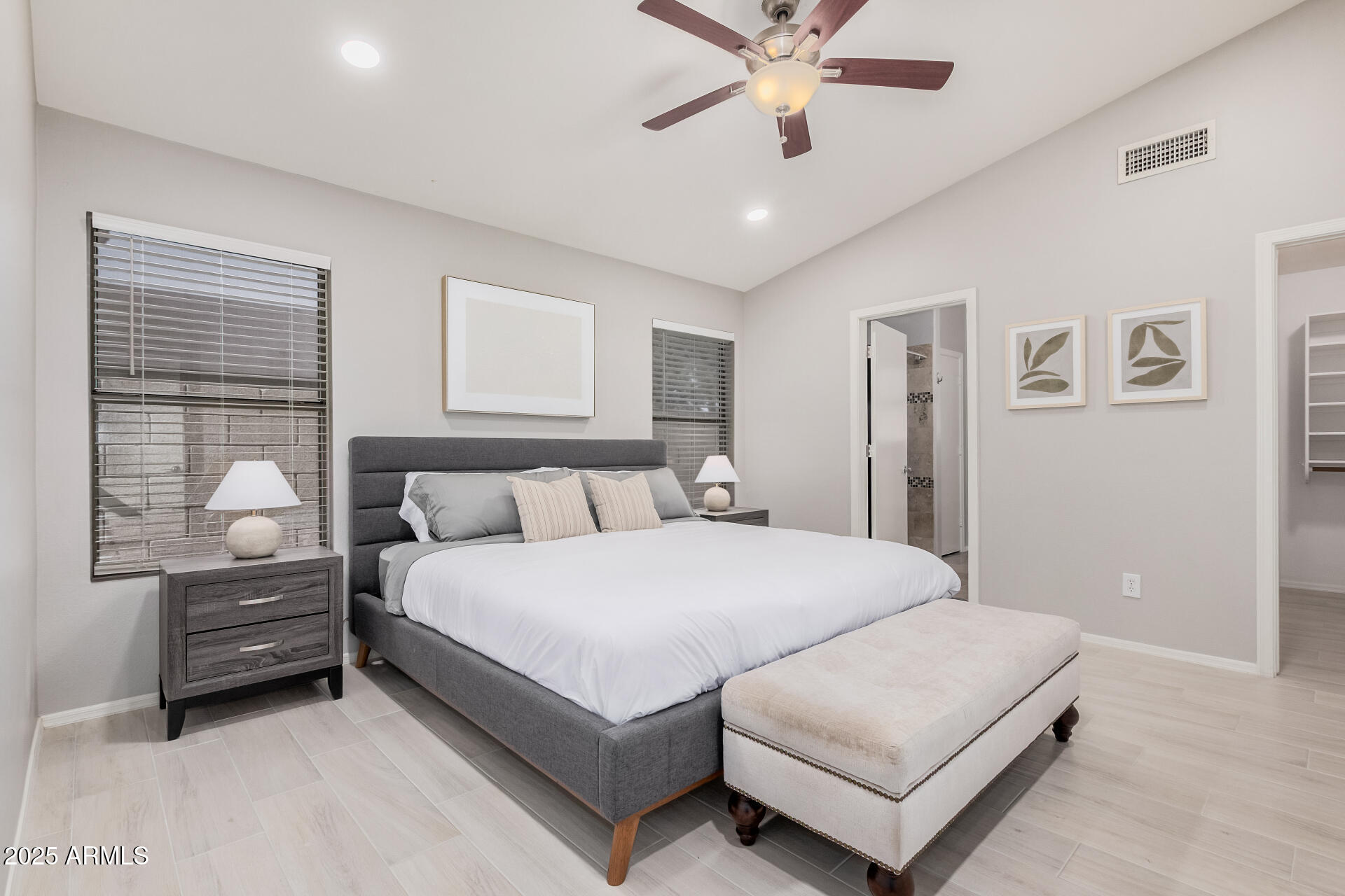 4632 East Mossman Road Phoenix, AZ 85050 - Photo 13 of 24 a bedroom with a bed and window