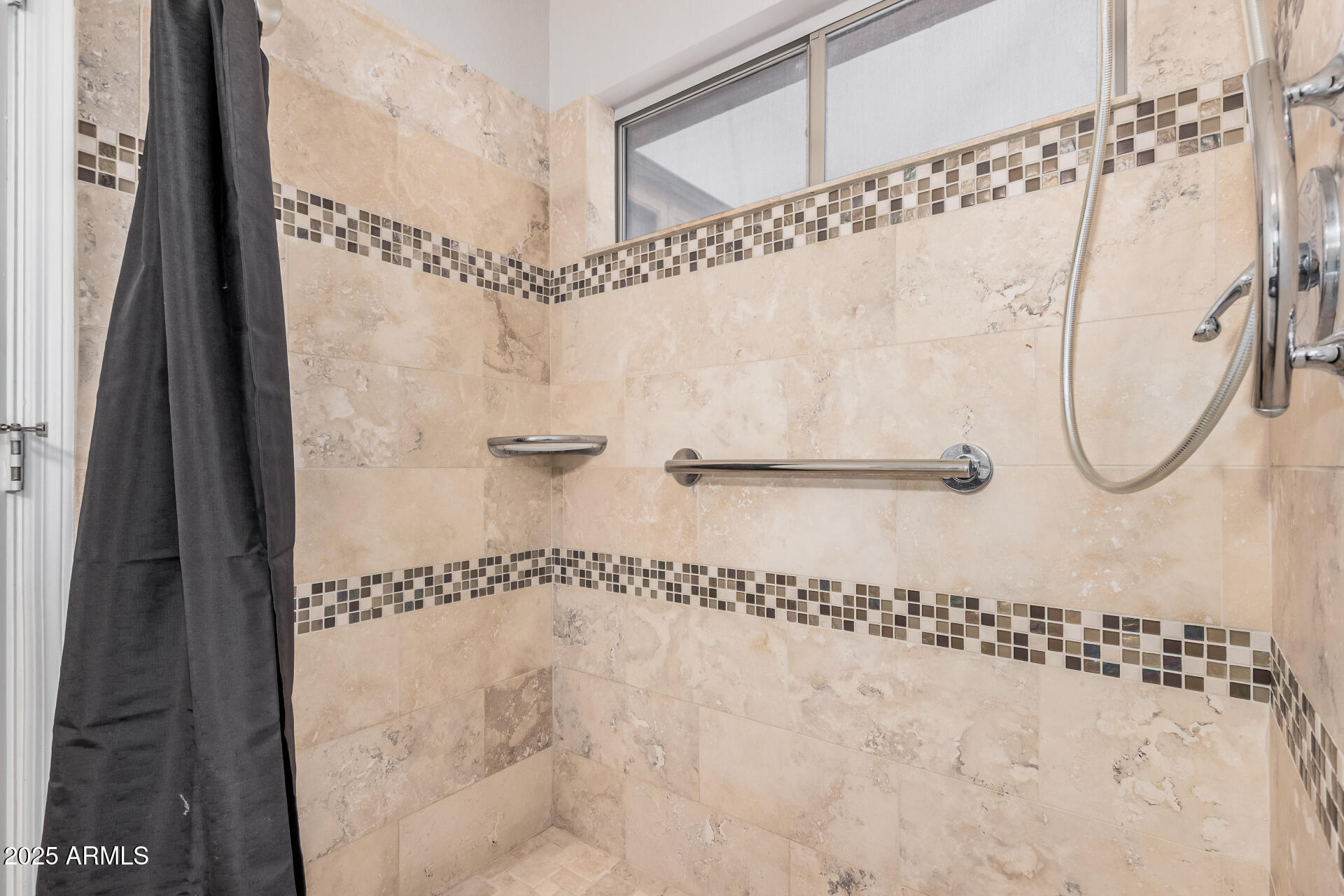 4632 East Mossman Road Phoenix, AZ 85050 - Photo 15 of 24 a bathroom with a shower and a mirror