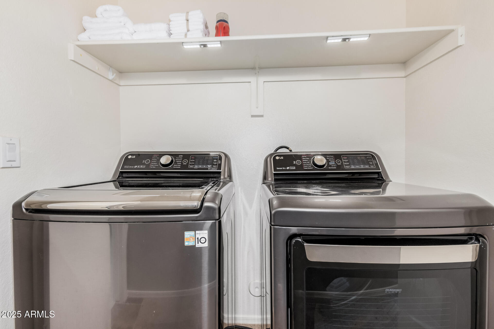 4632 East Mossman Road Phoenix, AZ 85050 - Photo 20 of 24 a close view of washer and dryer