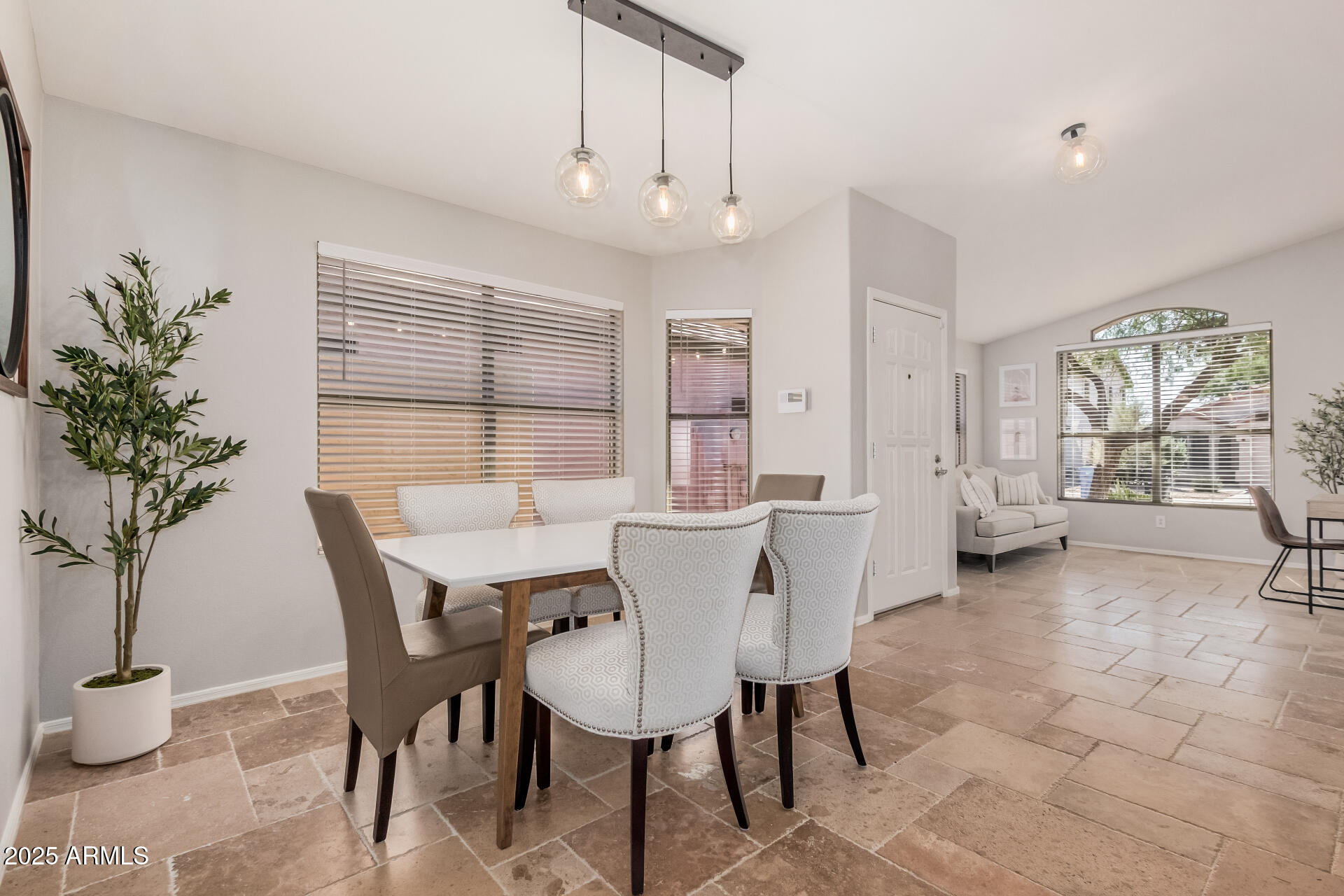 4632 East Mossman Road Phoenix, AZ 85050 - Photo 5 of 24 a view of a dining room with furniture and window