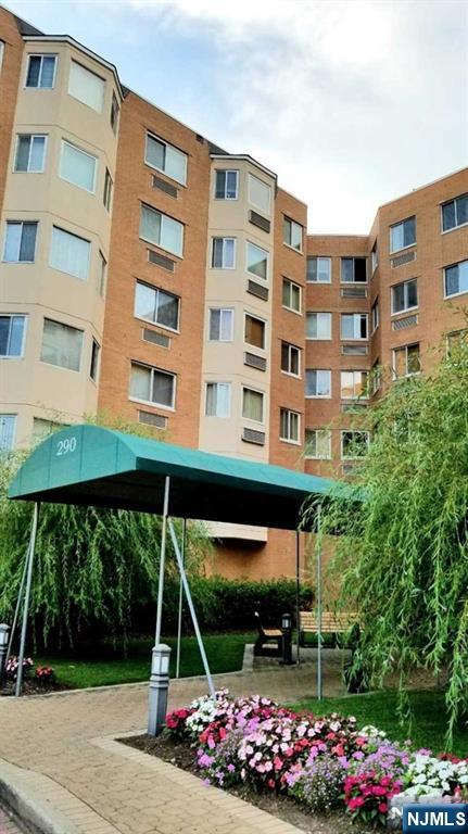290 Anderson Street, Unit 6I Hackensack, NJ 07601 - Photo 3 of 12 a view of building with garden