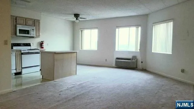 a room with furniture and a window