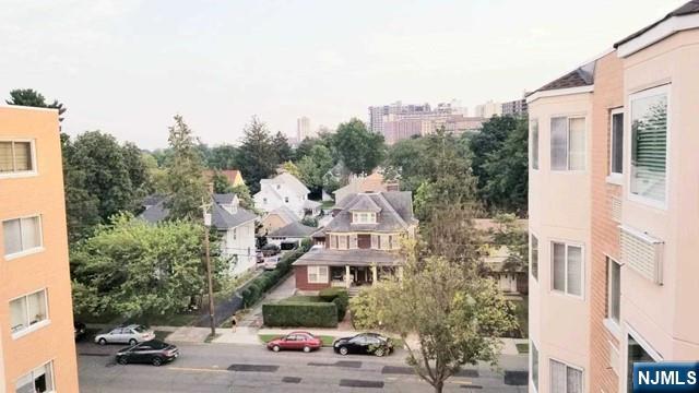 290 Anderson Street, Unit 6I Hackensack, NJ 07601 - Photo 7 of 12 a view of multiple houses with a street
